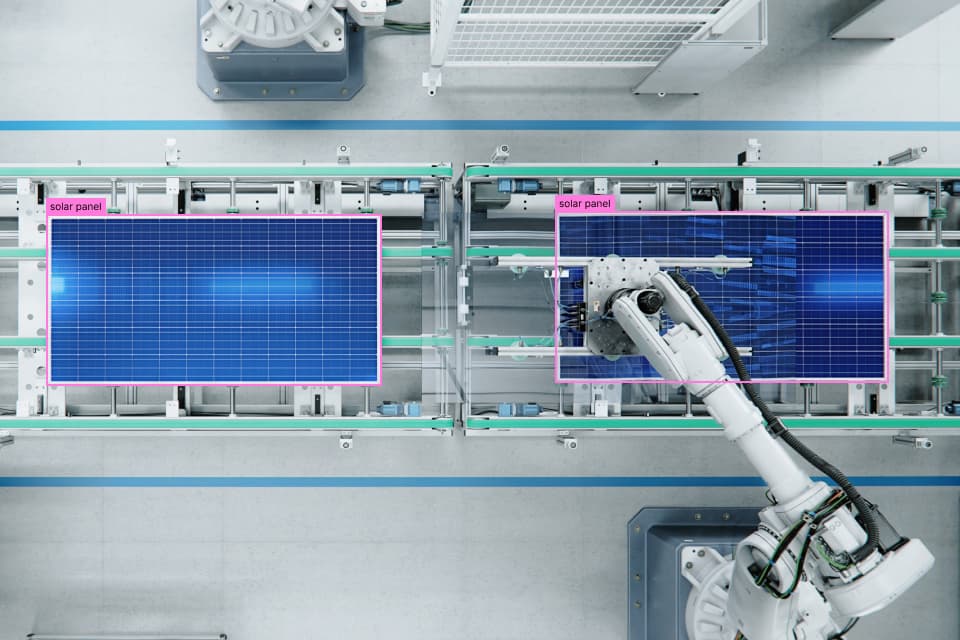 Solar panels on an assembly line labeled with bounding boxes